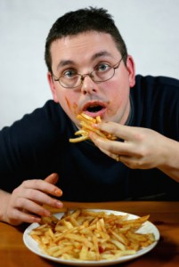 man-overeating