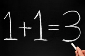 Writing 1+1=3 on a blackboard.